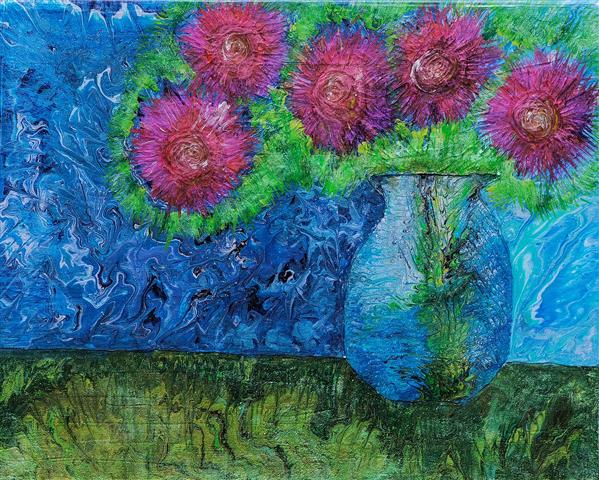 Red flowers in a transparent vase